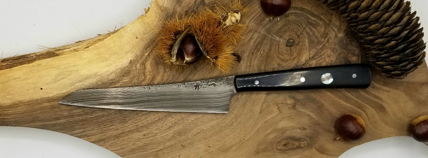 Couteau de cuisine lame forgée en acier damas 90mcv8/15n20 manche en ebene